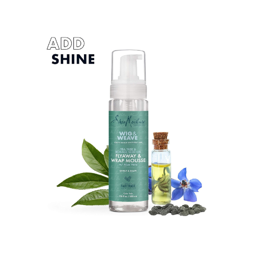 Shea Moisture hair care products with leaves and flowers on a white background