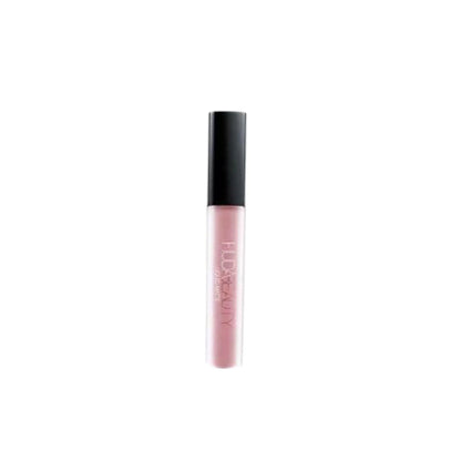 Lip gloss with black cap on a white background