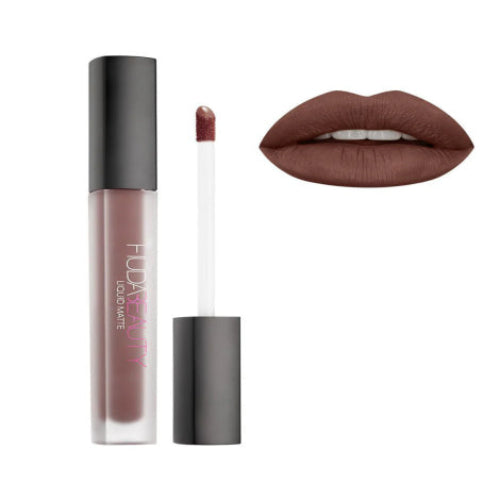 Lipstick with applicator and color swatch on a white background